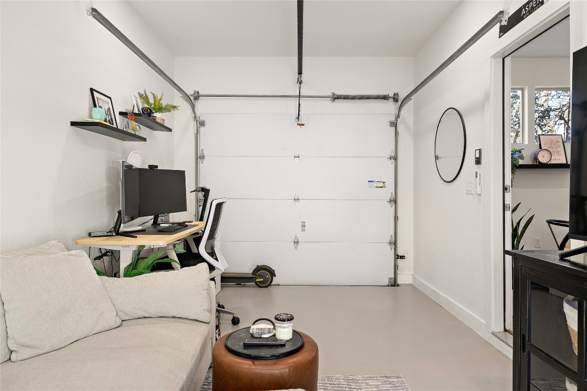 1402 Singleton Avenue, Unit B Austin, TX 78702 - Photo 11 of 26 a living room with hard wood flooring and a white couch