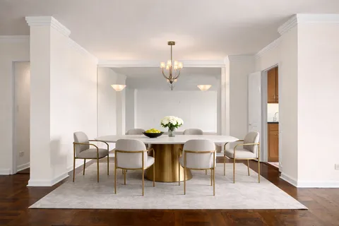 a view of livingroom with hardwood floor and hallway