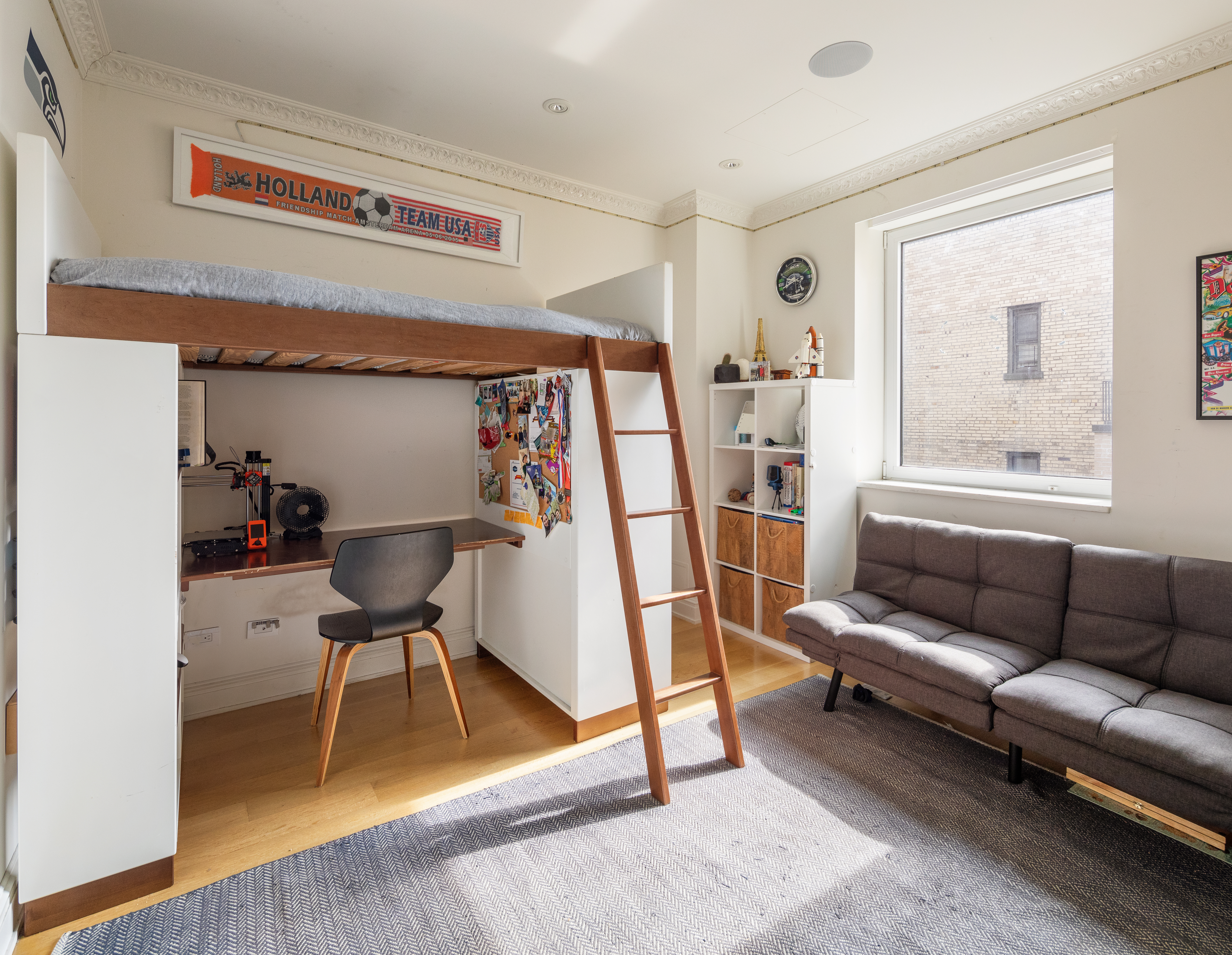 309 West 86th Street, Unit PH Manhattan, NY 10024 - Photo 14 of 16 a living room with furniture and a wooden floor