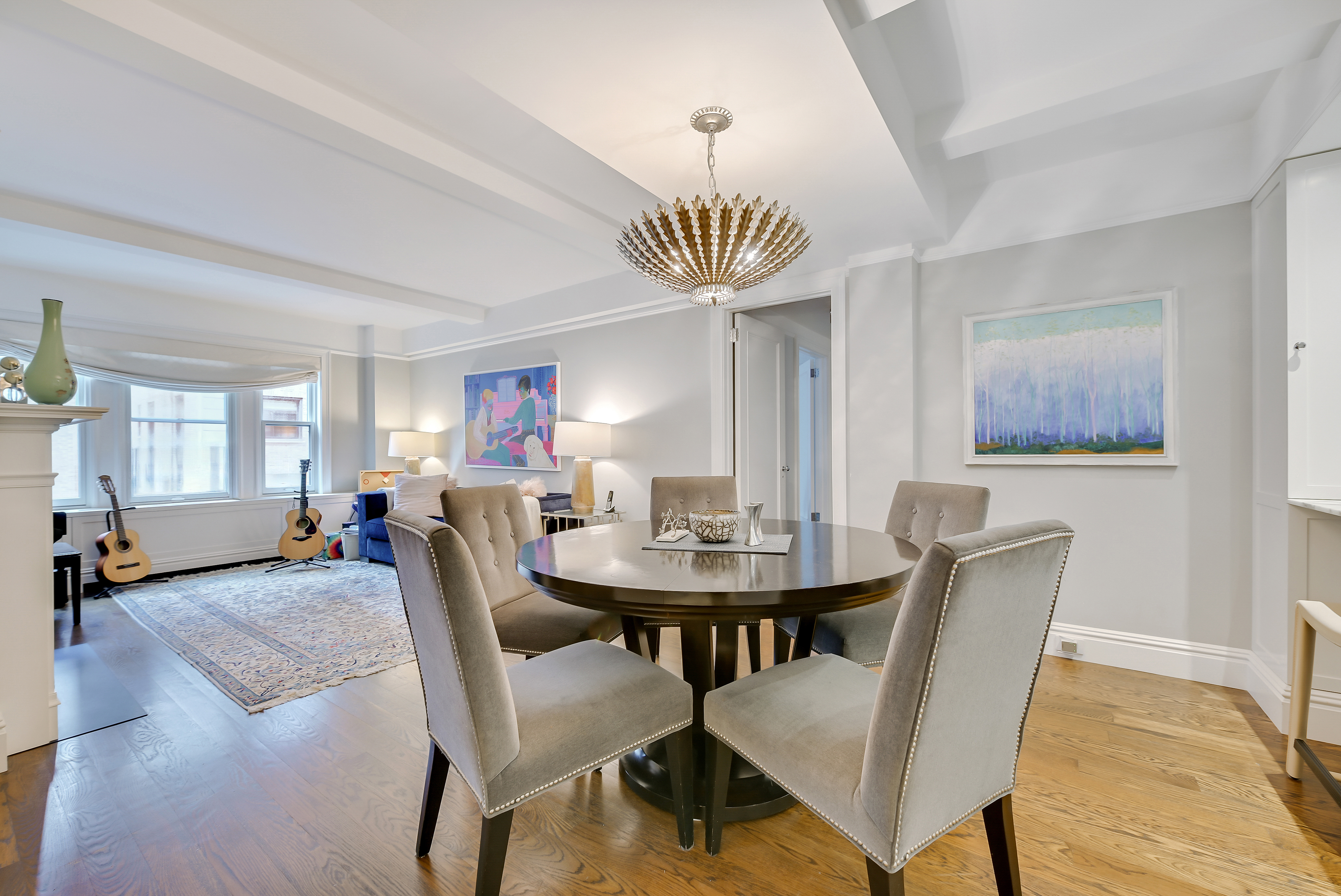 7 East 85th Street, Unit 5AB Manhattan, NY 10028 - Photo 3 of 12 a view of a dining room with furniture