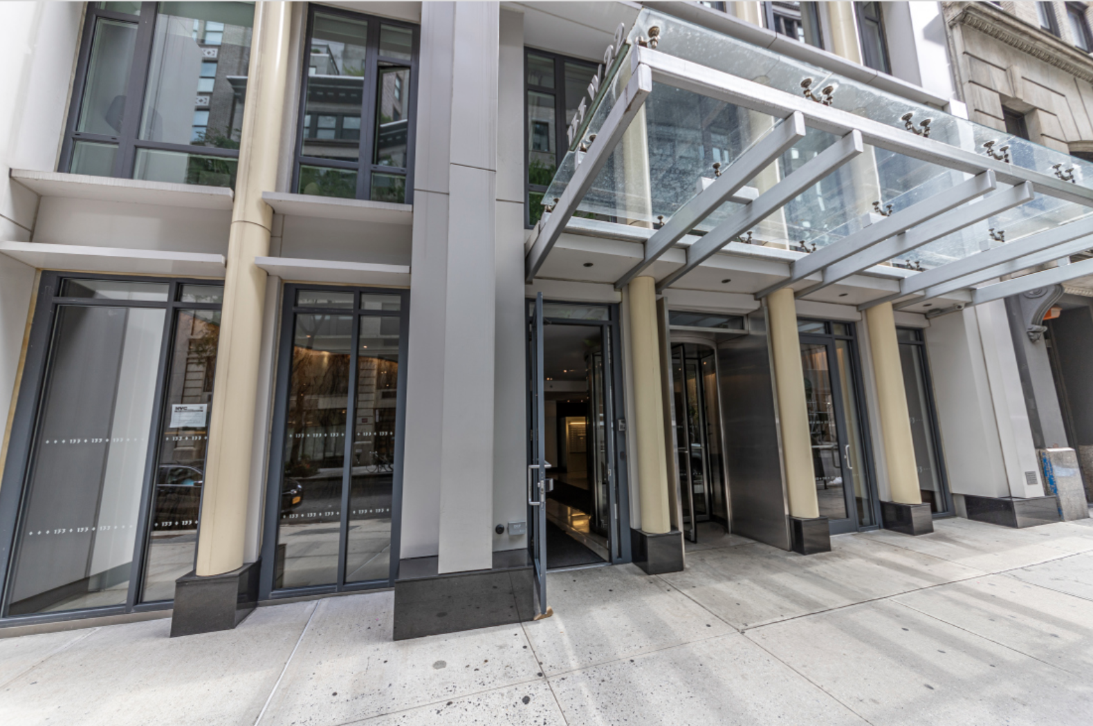 133 West 22nd Street, Unit 8G Manhattan, NY 10011 - Photo 15 of 16 a view of a building with an entryway