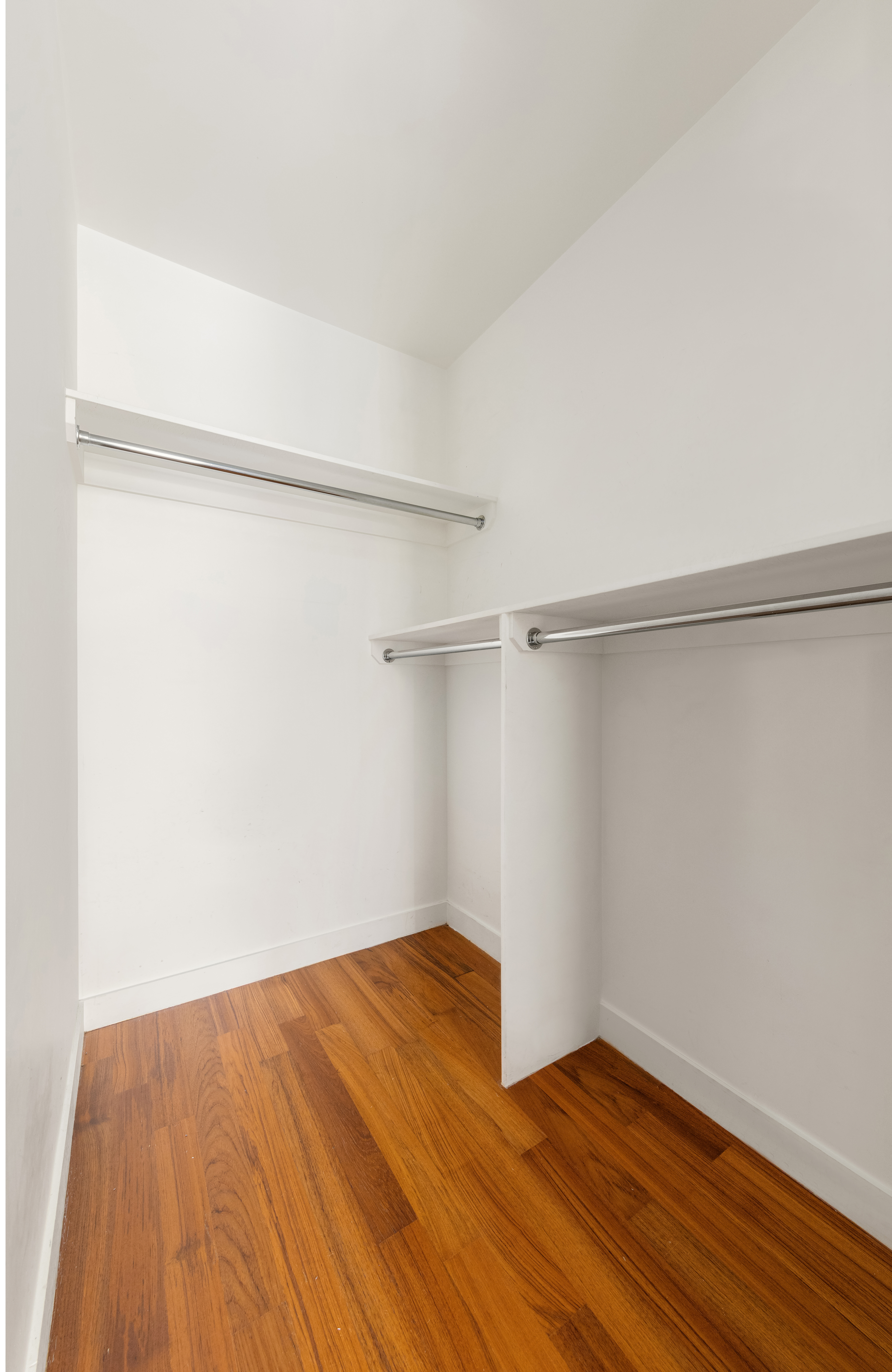 15 William Street, Unit 7B Manhattan, NY 10005 - Photo 5 of 9 a view of a room with wooden floor