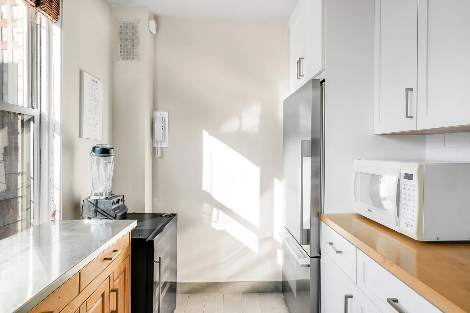 a kitchen with a sink and a stove top oven