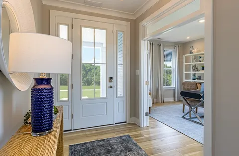 a view of livingroom with furniture and windows