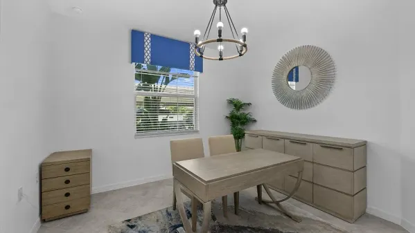 a view of a dining room with furniture