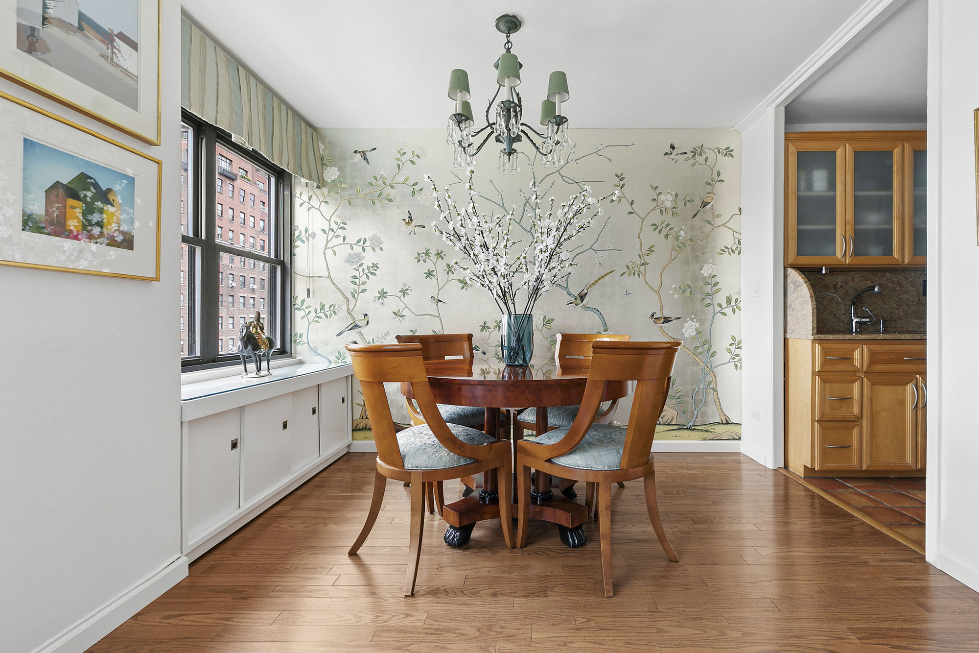 1199 Park Avenue, Unit 10K Manhattan, NY 10128 - Photo 4 of 12 a view of a dining room with furniture window and wooden floor
