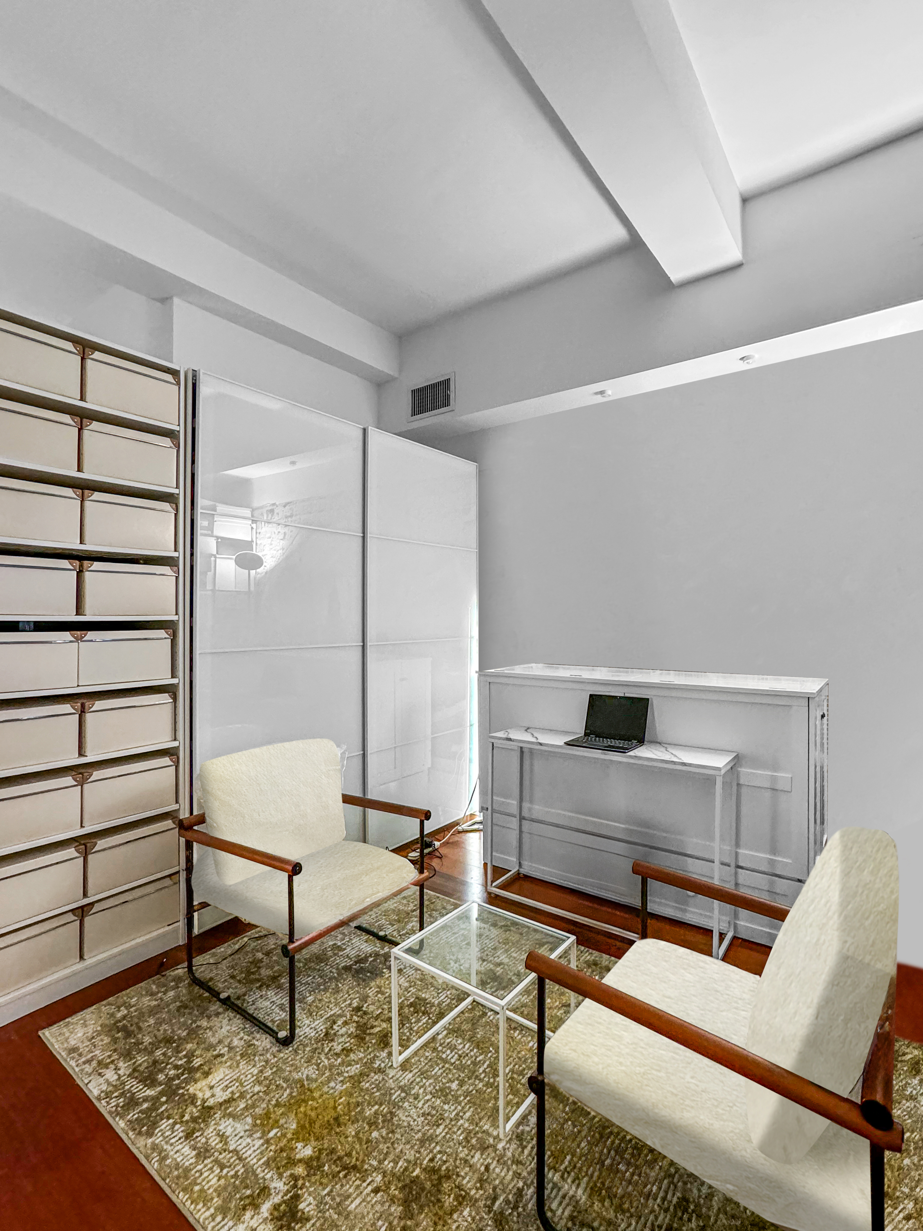 80 John Street, Unit 10D Manhattan, NY 10038 - Photo 3 of 6 a living room with furniture