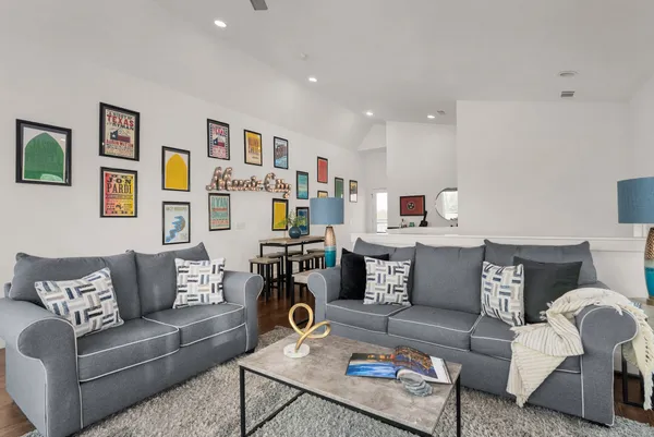 a living room with furniture and a couch