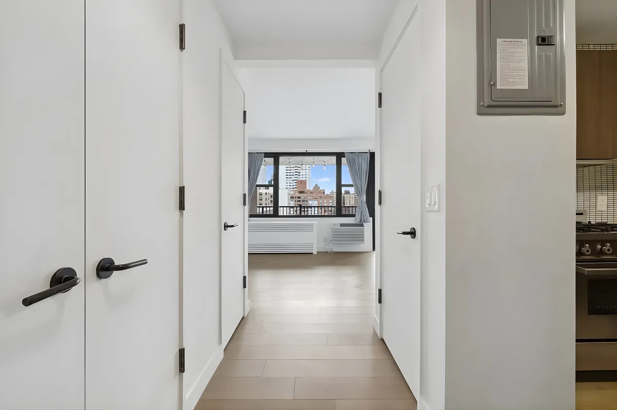 a view of a hallway with a glass door