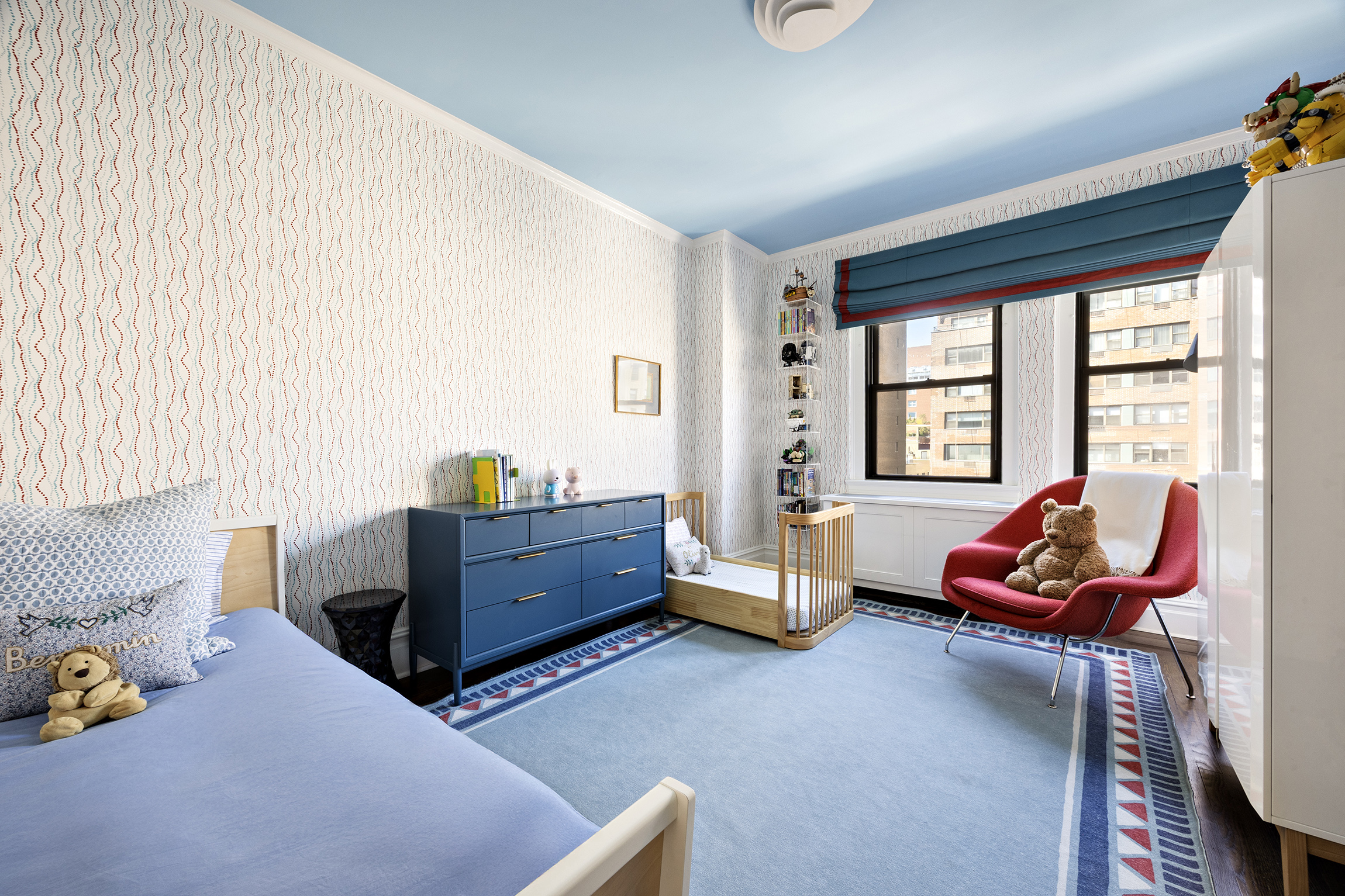 1035 Park Avenue, Unit 11B Manhattan, NY 10028 - Photo 10 of 13 a living room with furniture toys and a window