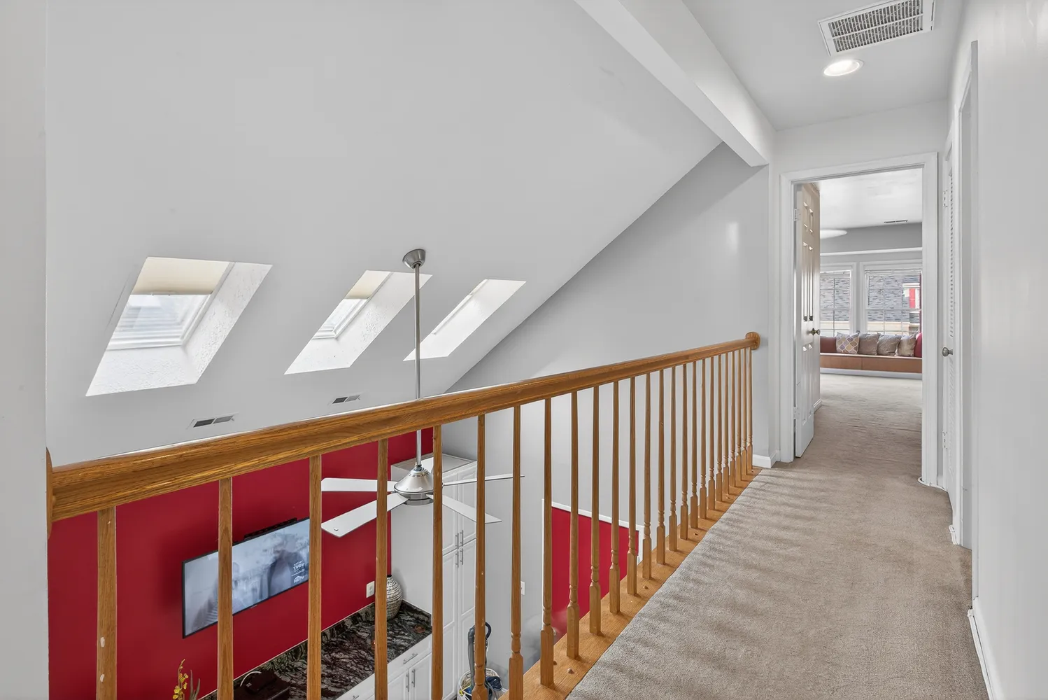 a view of hallway with furniture