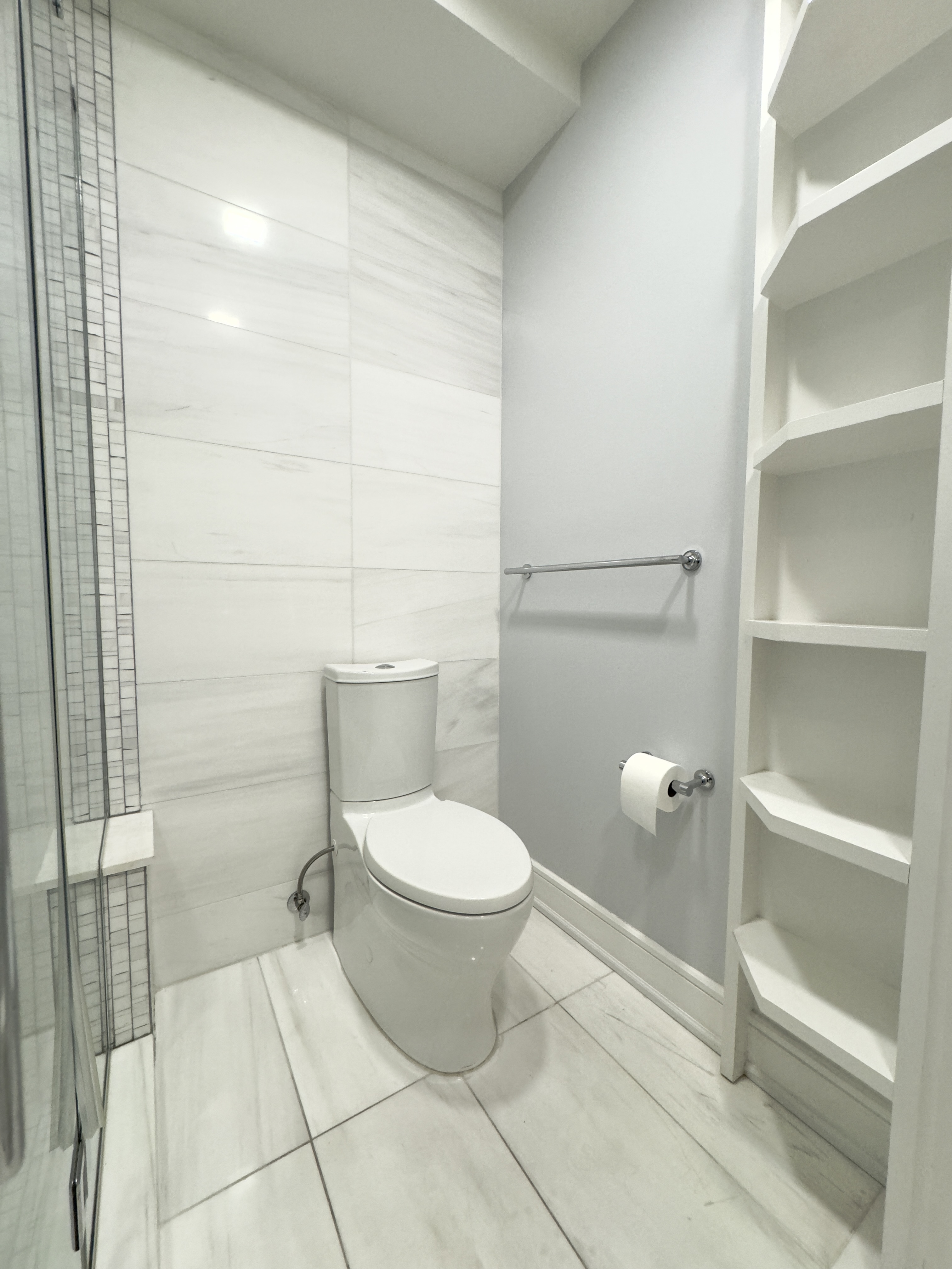 2 Tudor City Place, Unit 12DS Manhattan, NY 10017 - Photo 17 of 20 a bathroom with a toilet and a shower