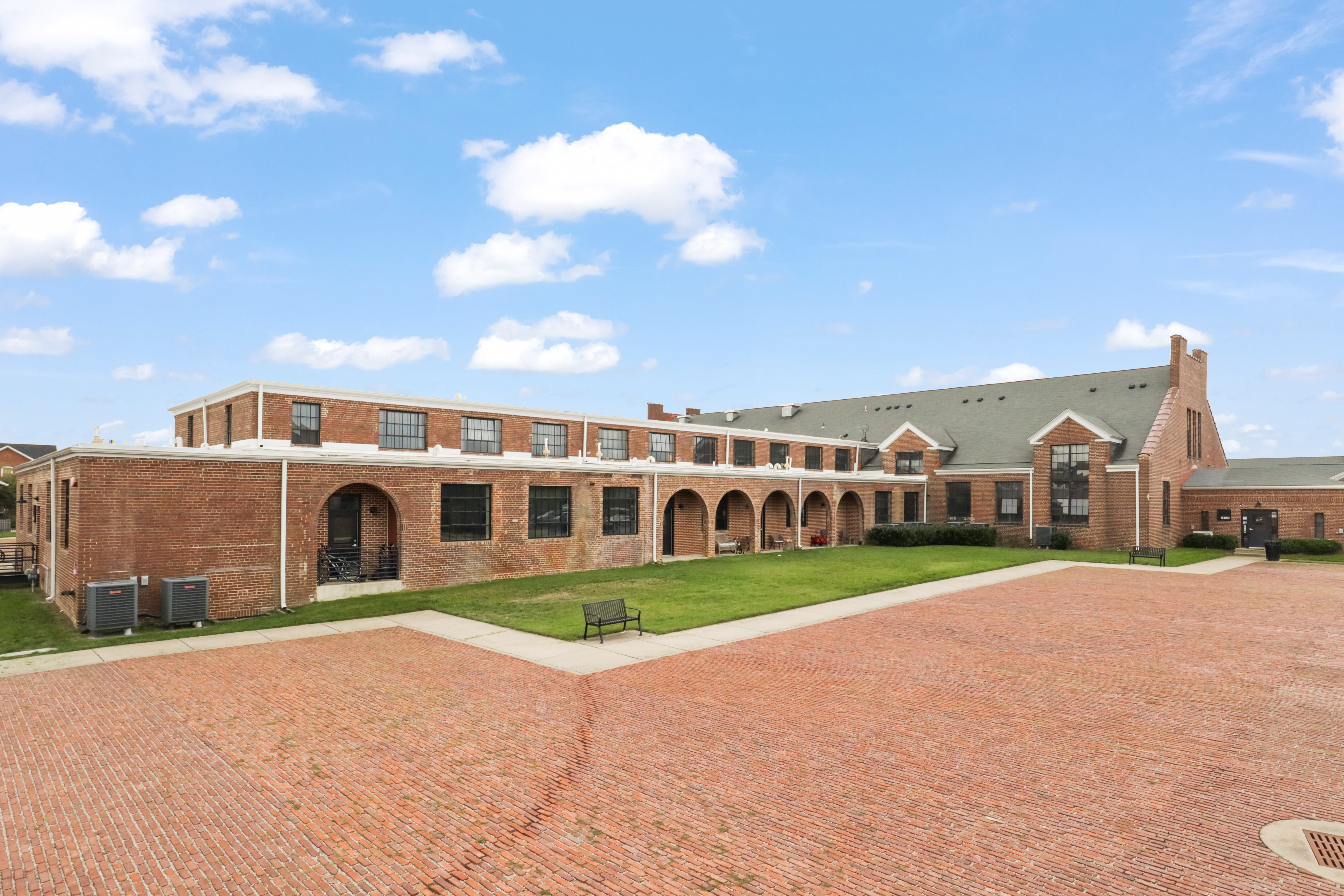 9101 Power House Road Lorton, VA 22079 - Photo 70 of 75 a front view of a house with a yard and garage