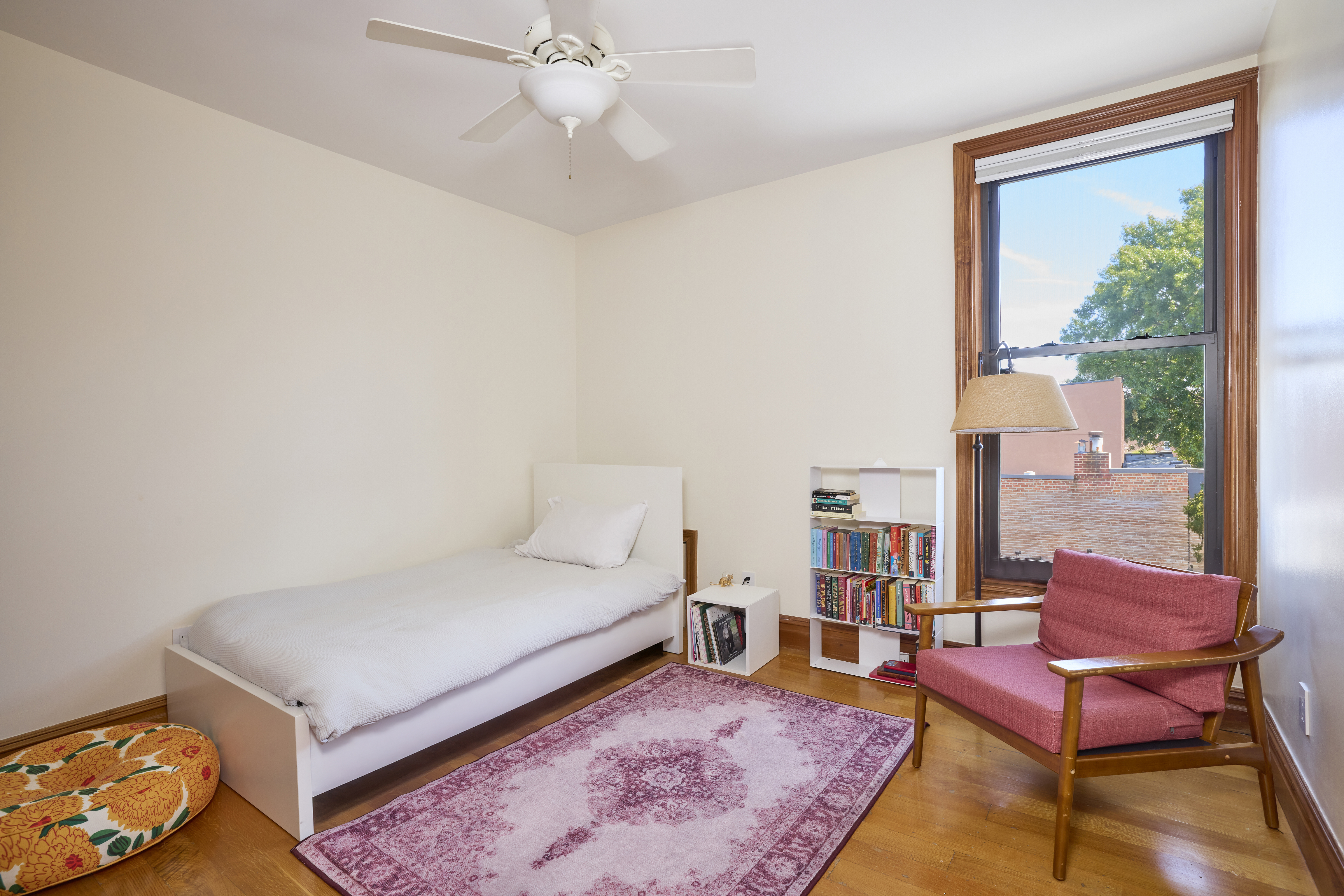 1702 8th Avenue, Unit 3 Brooklyn, NY 11215 - Photo 7 of 15 a living room with furniture and a rug