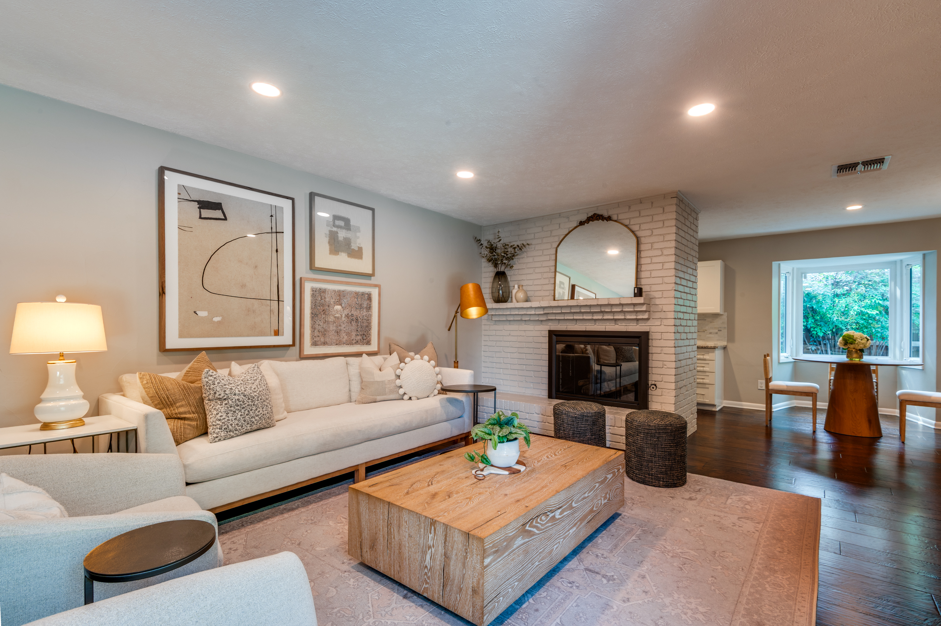 3363 Merrell Road Dallas, TX 75229 - Photo 7 of 29 a living room with furniture and a fireplace