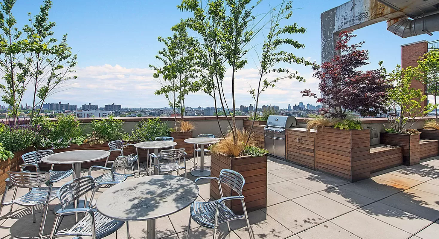 30 Bayard Street, Unit 4F Brooklyn, NY 11211 - Photo 9 of 12 a view of a chairs and table on the terrace