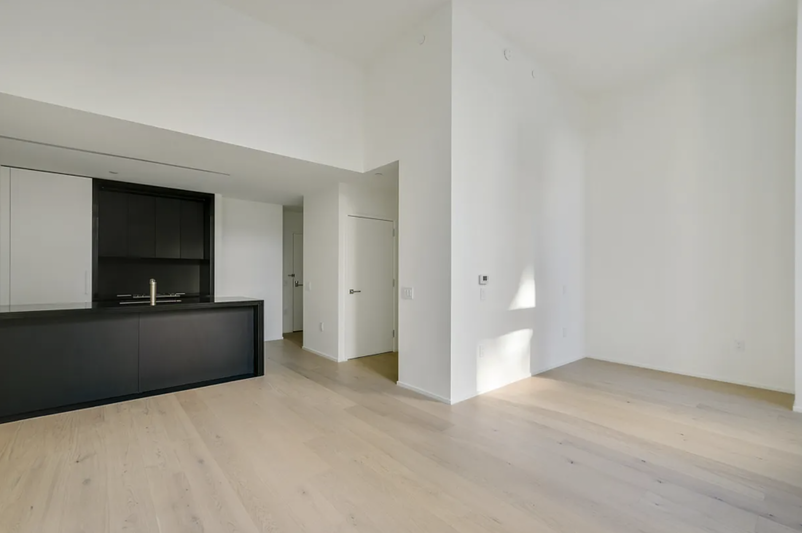 121 East 22nd Street, Unit N203 Manhattan, NY 10010 - Photo 8 of 10 a view of a living room with flat screen tv