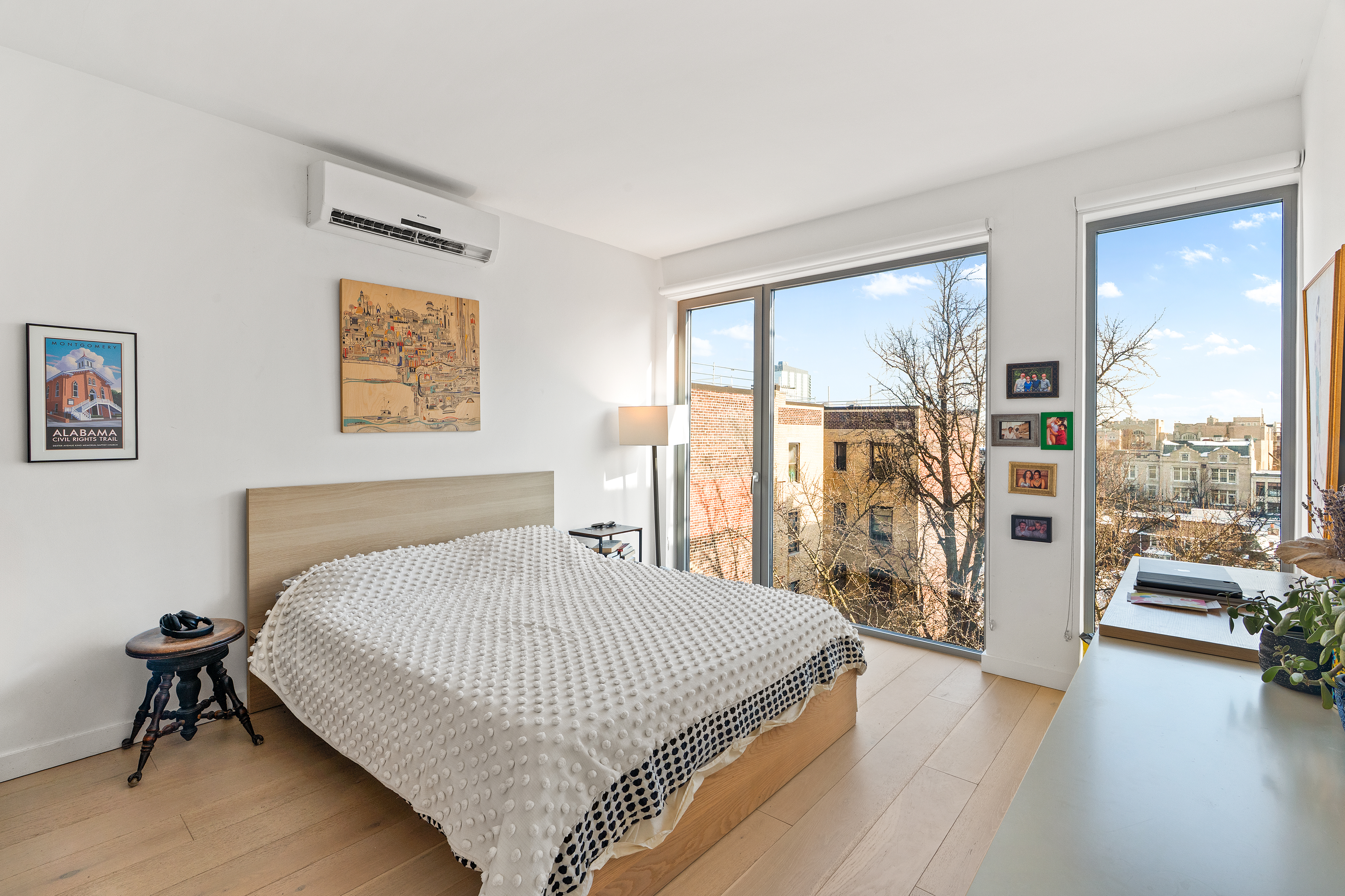 567 Ocean Avenue, Unit A704 Brooklyn, NY 11226 - Photo 3 of 7 a bedroom with a bed and a large window