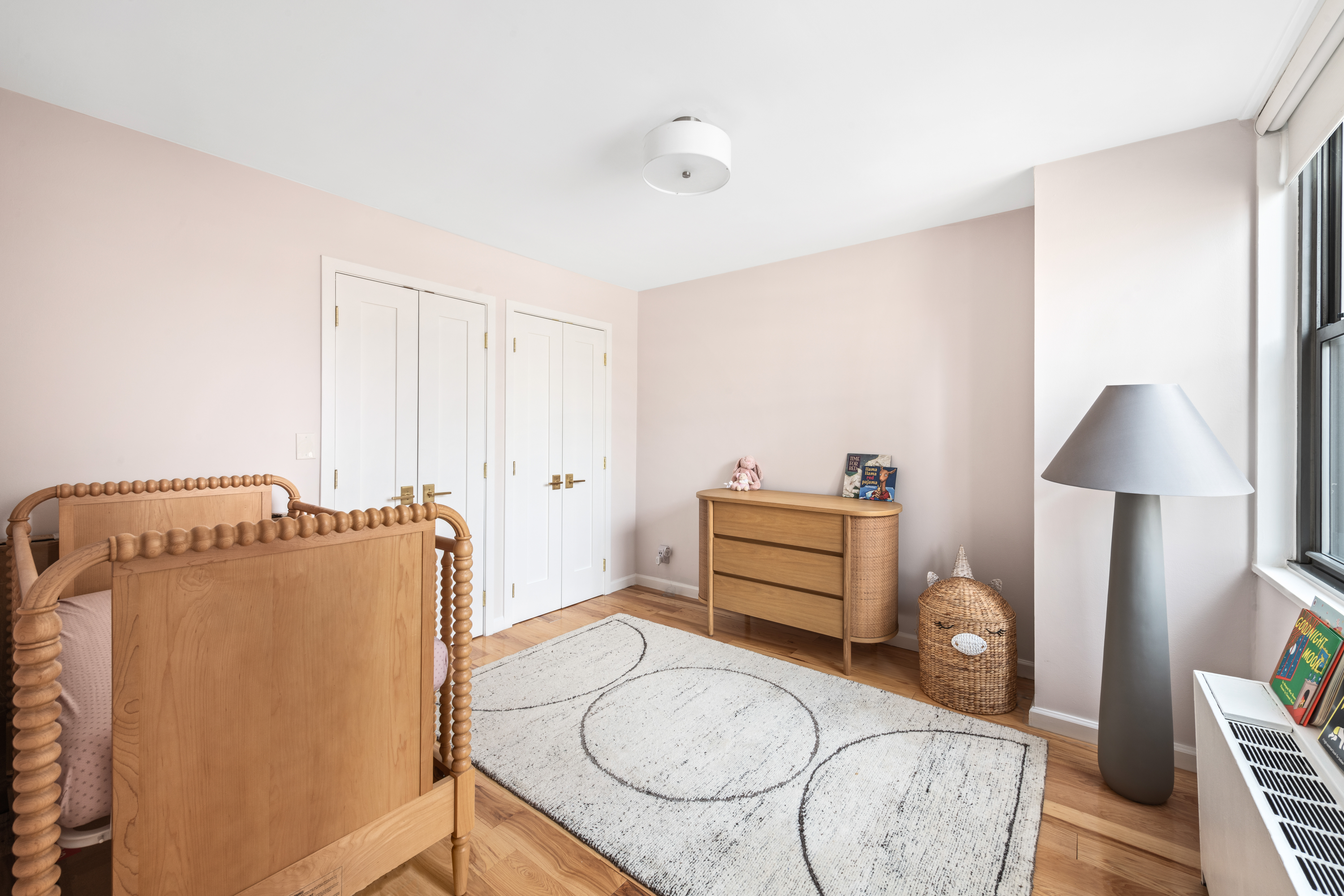 444 East 86th Street, Unit 16B Manhattan, NY 10028 - Photo 8 of 14 a bathroom with a granite countertop sink and a mirror