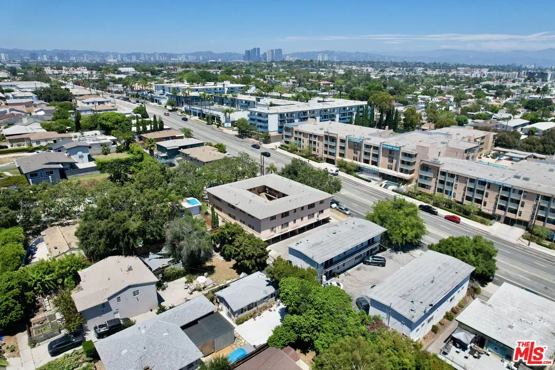 an aerial view of a city with lots of residential buildings