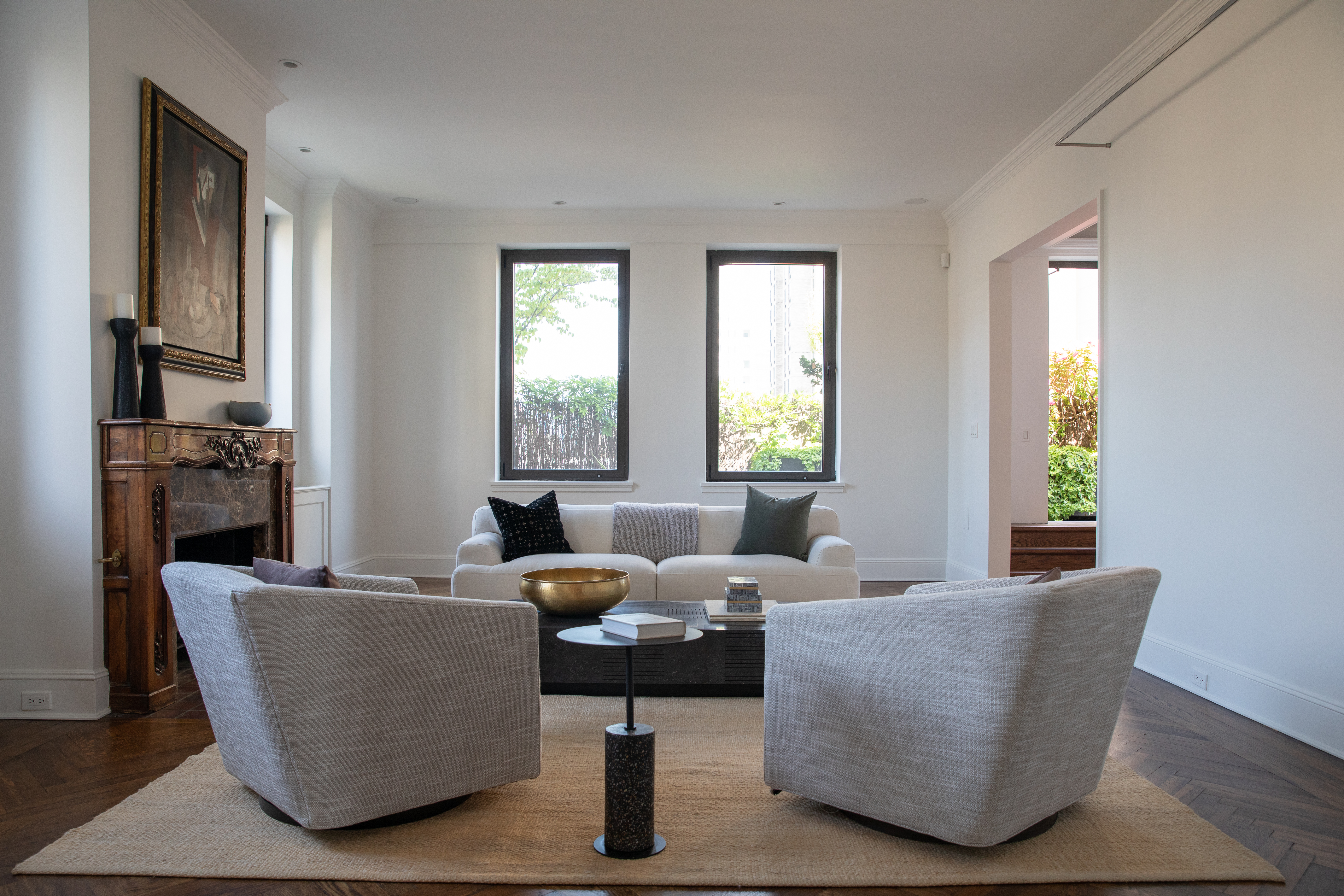 1070 Park Avenue, Unit PHE Manhattan, NY 10128 - Photo 2 of 14 a living room with furniture and a window