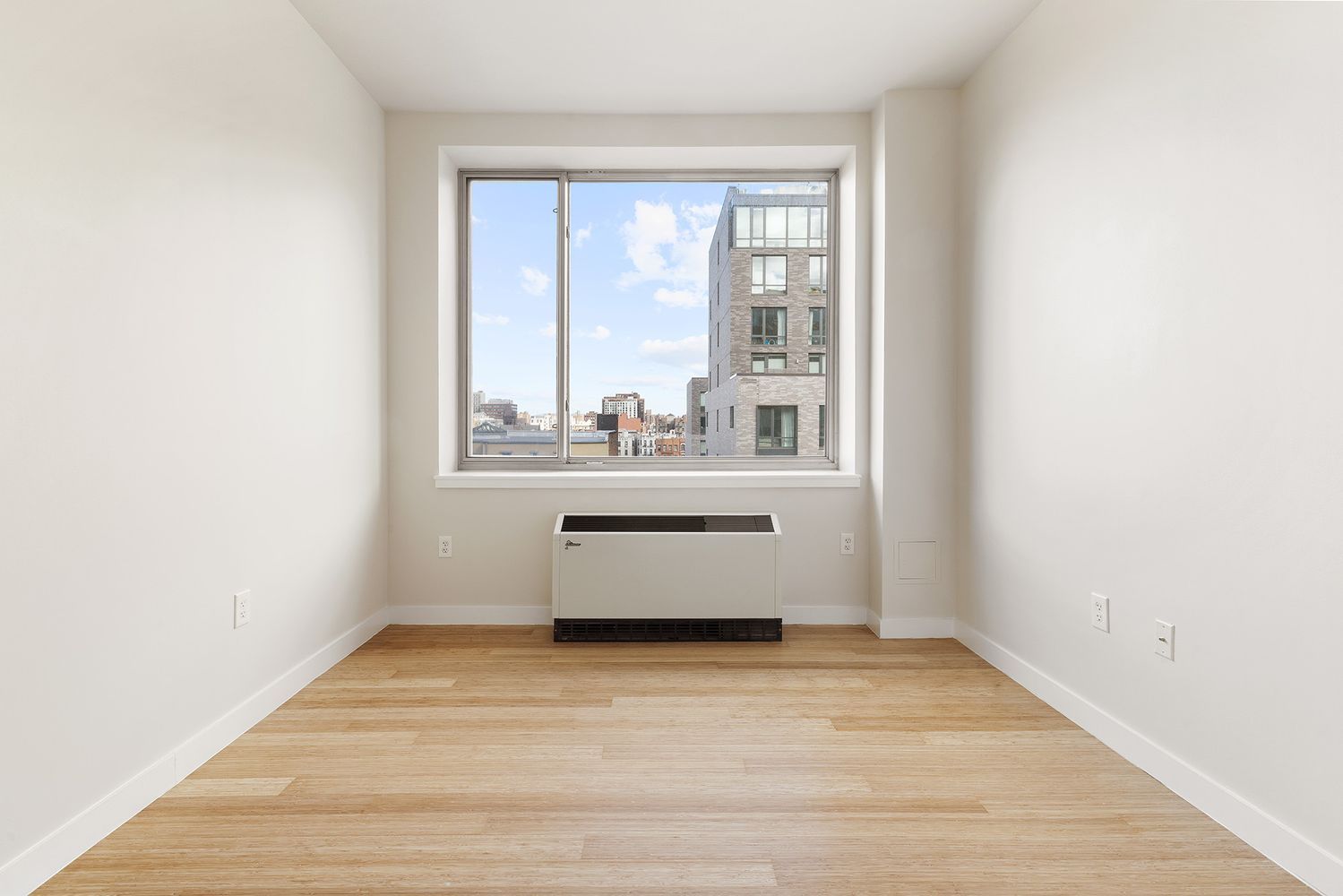 40 West 116th Street, Unit A808 Manhattan, NY 10026 - Photo 5 of 19 a view of an empty room with a window