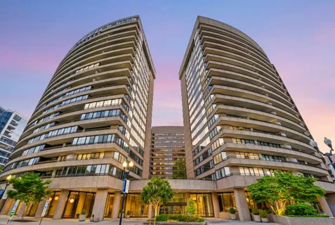 a front view of multi story residential apartment building