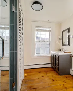 a close view of a utility room with dryer and washer