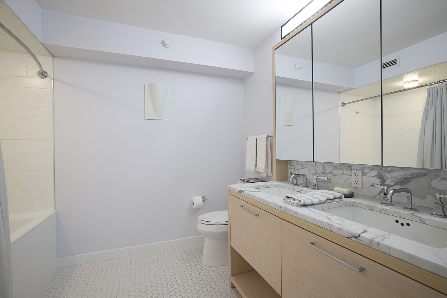 101 West 87th Street, Unit 205 Manhattan, NY 10024 - Photo 7 of 14 a bathroom with a granite countertop sink a toilet and a shower