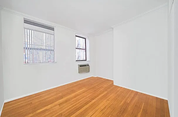 103 West 105th Street, Unit 2B Manhattan, NY 10025 - Photo 8 of 9 a view of empty room with wooden floor