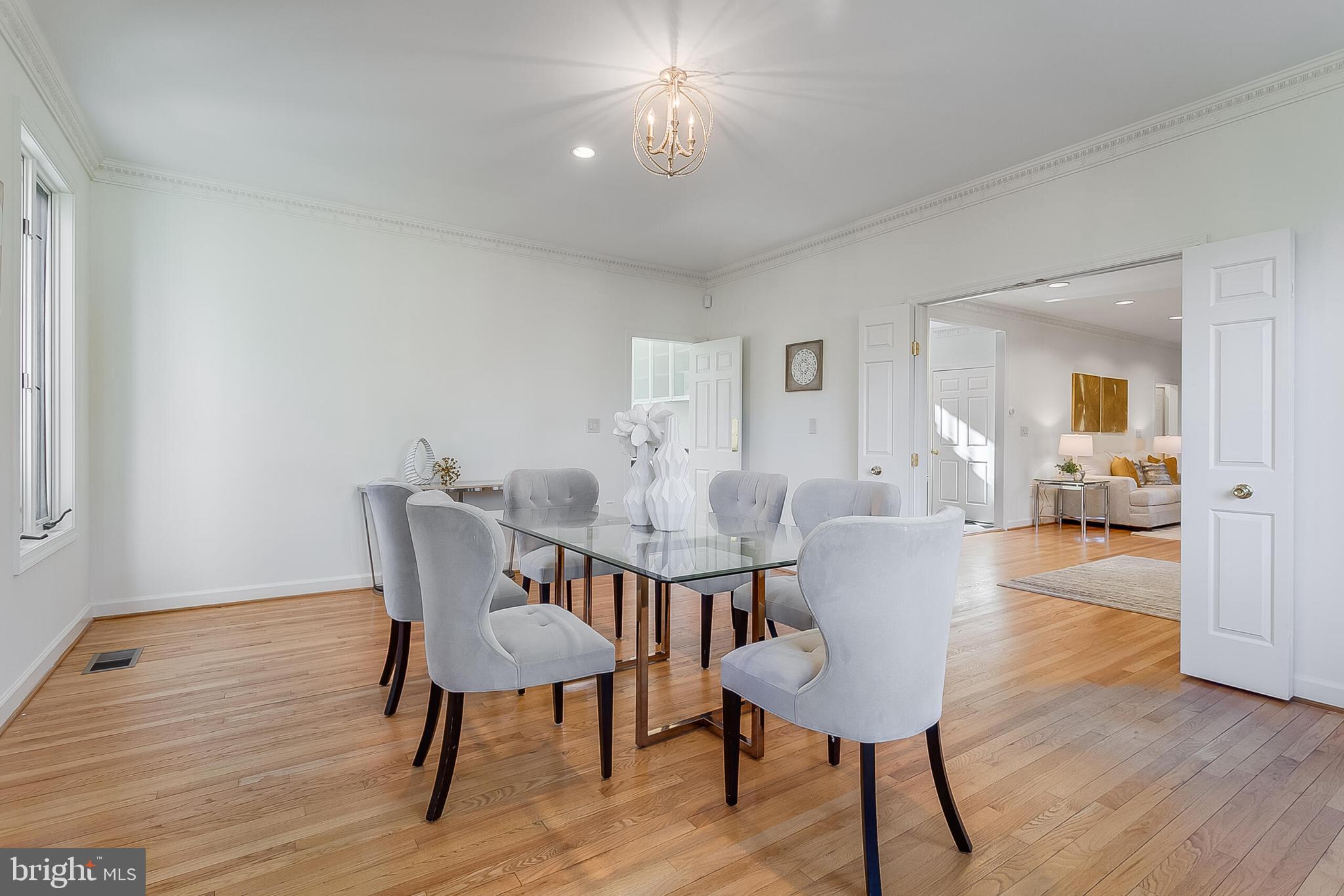 4709 Foxhall Crescent Northwest Washington, DC 20007 - Photo 20 of 57 a view of a dining room with furniture and wooden floor