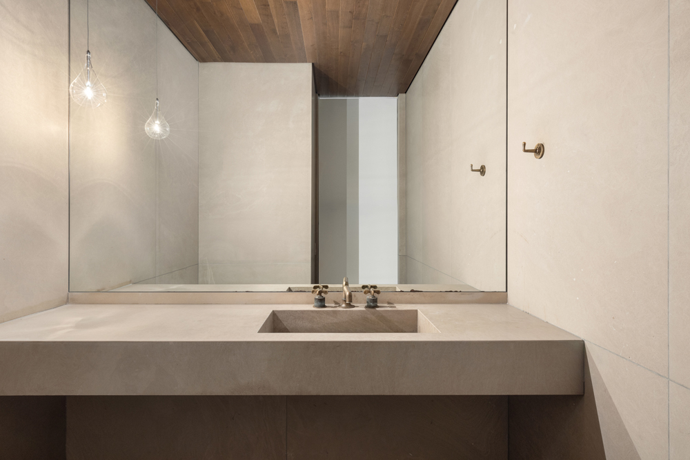 527 West 27th Street, Unit 3C Manhattan, NY 10001 - Photo 13 of 14 a bathroom with a sink and a mirror