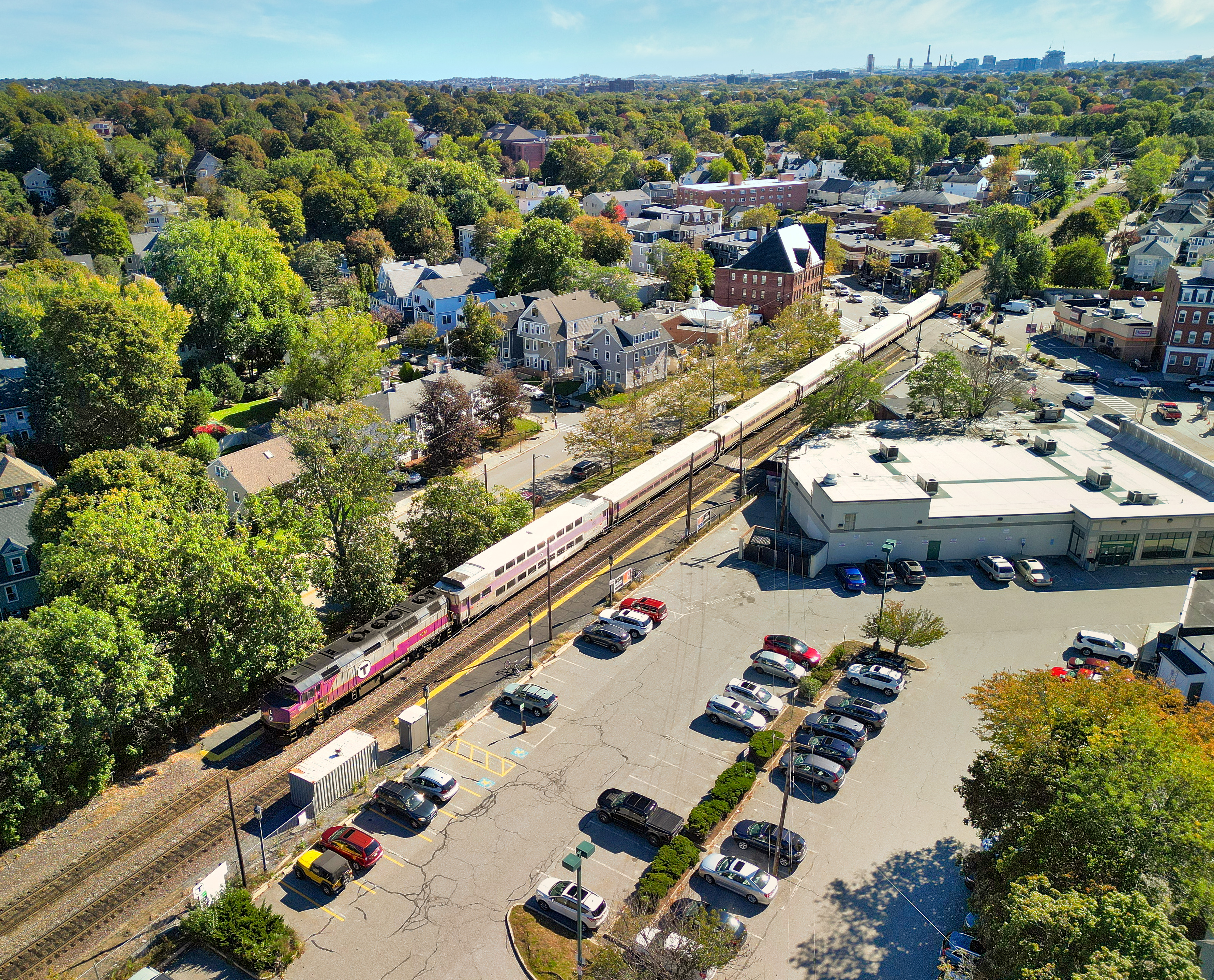 437 High Street Medford, MA 02155 - Photo 11 of 12 an aerial view of a resort with swimming pool and outdoor seating