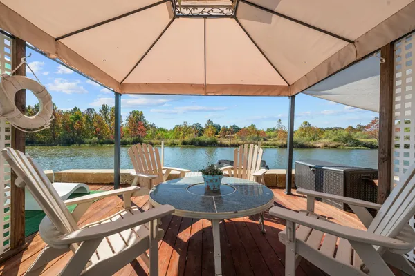 a view of a swimming pool with a patio