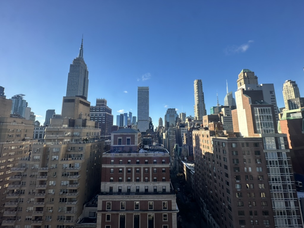 45 Park Avenue, Unit 1801 Manhattan, NY 10016 - Photo 10 of 12 a view of a city with tall buildings