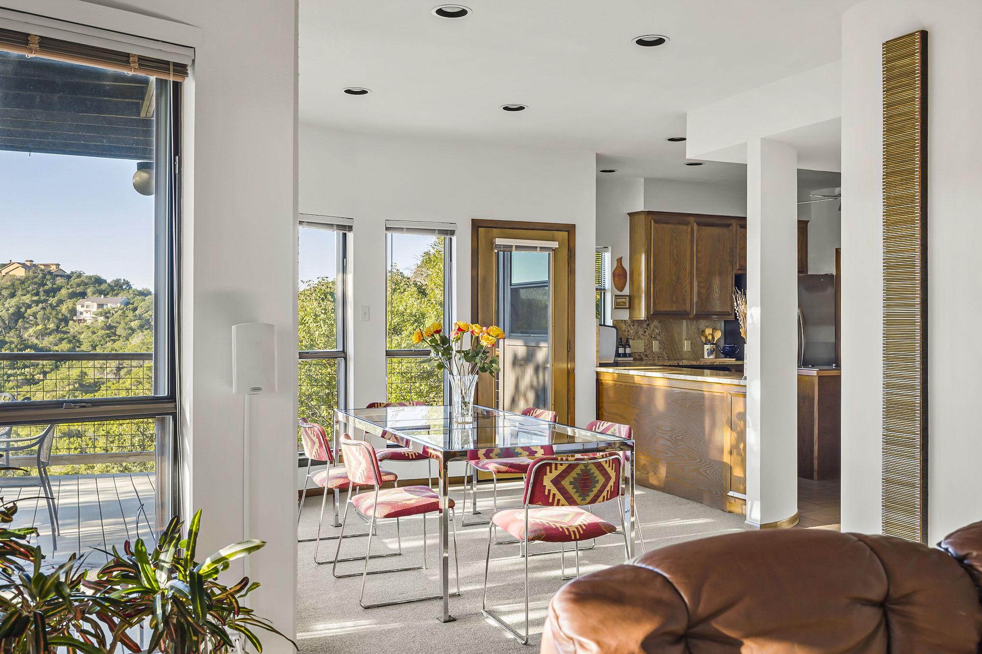 1605 The High Road Austin, TX 78746 - Photo 8 of 45 a room with furniture and a large window