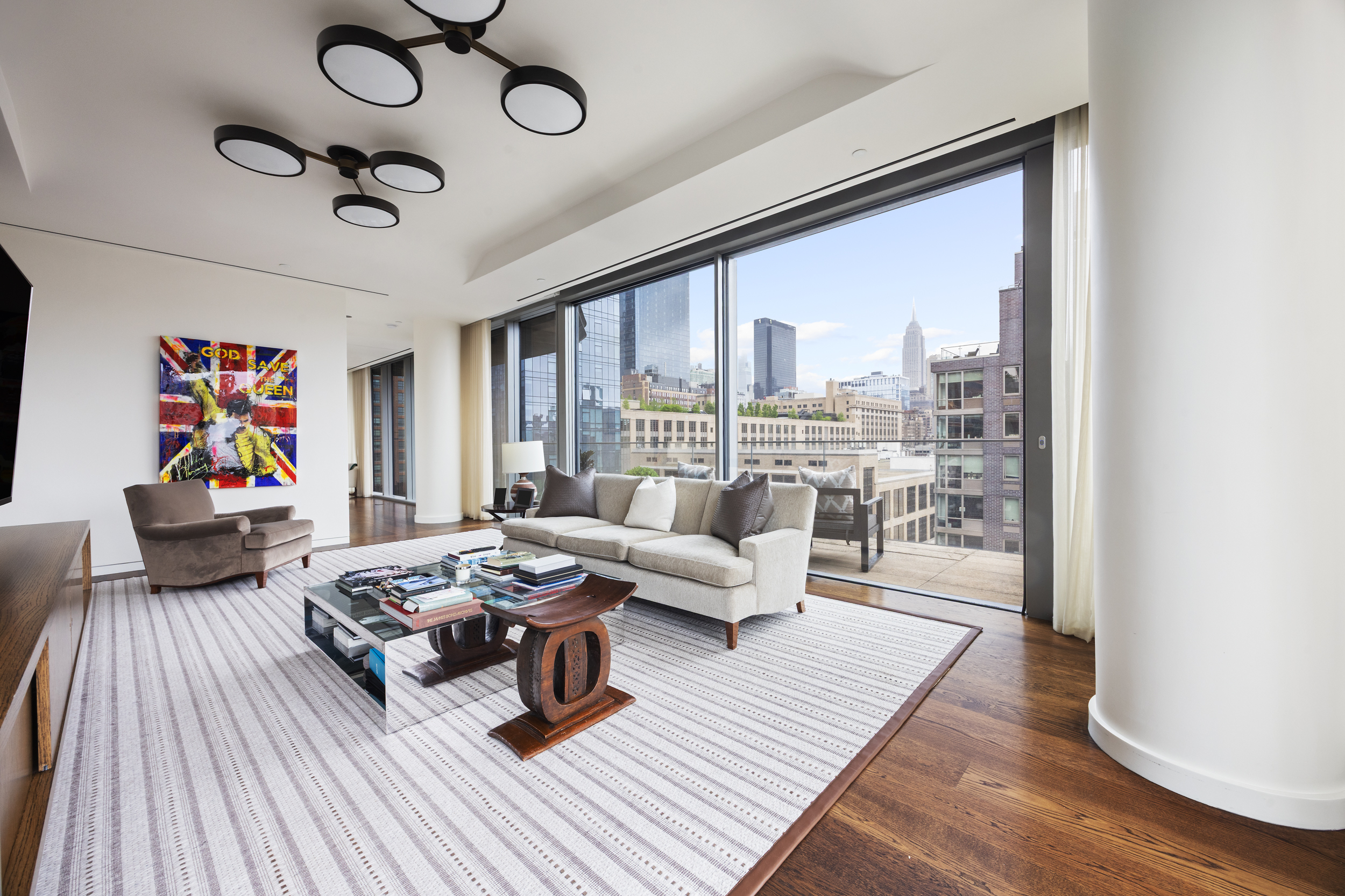 520 West 28th Street, Unit PH37 Manhattan, NY 10001 - Photo 26 of 45 a living room with furniture and a large window