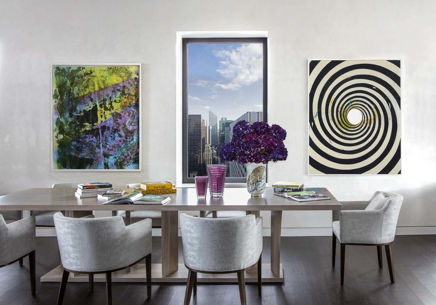 20 West 53rd Street, Unit 42A Manhattan, NY 10019 - Photo 10 of 31 a dining room with furniture and wooden floor