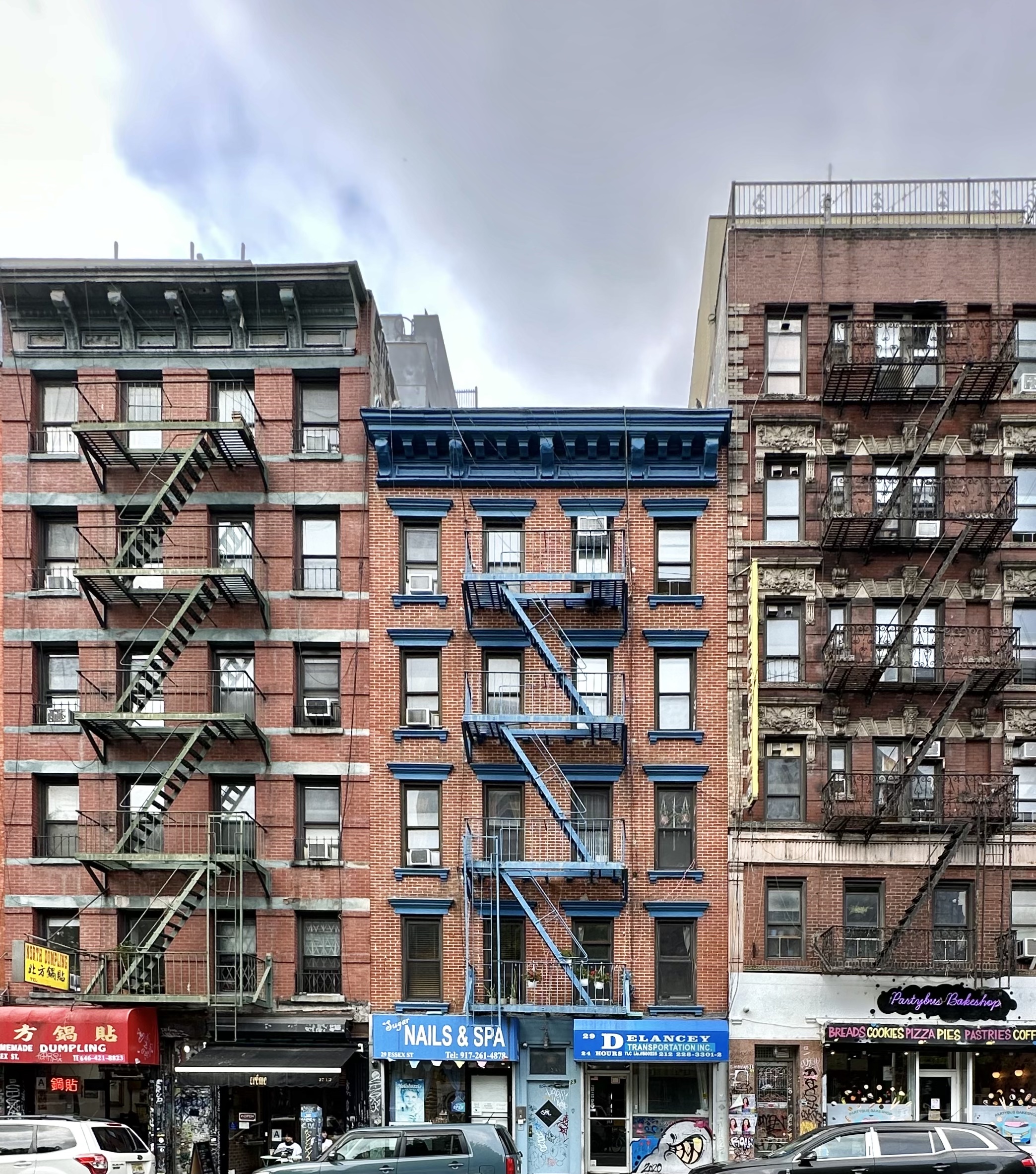 a front view of a building with glass windows