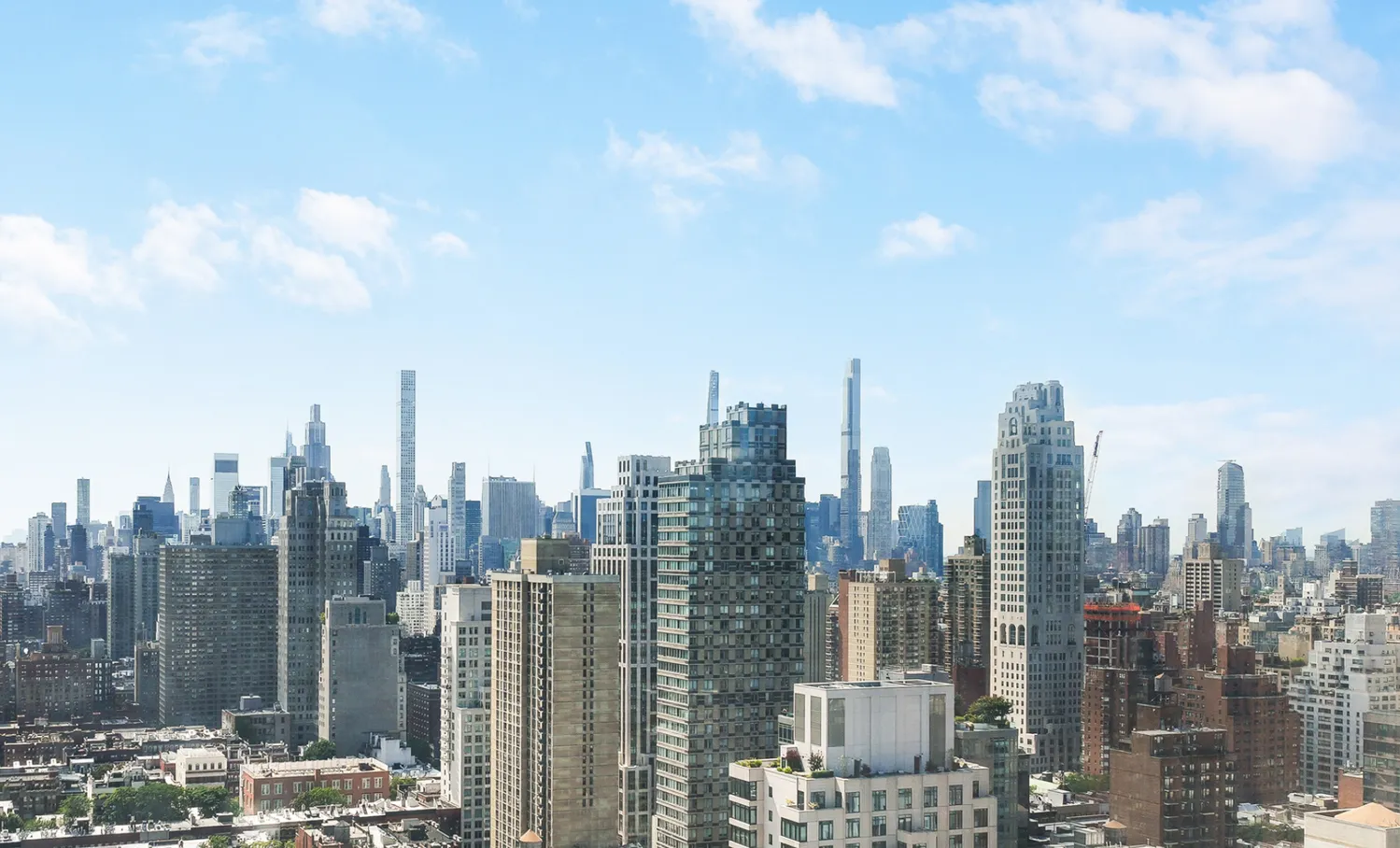 a view of a city with tall buildings