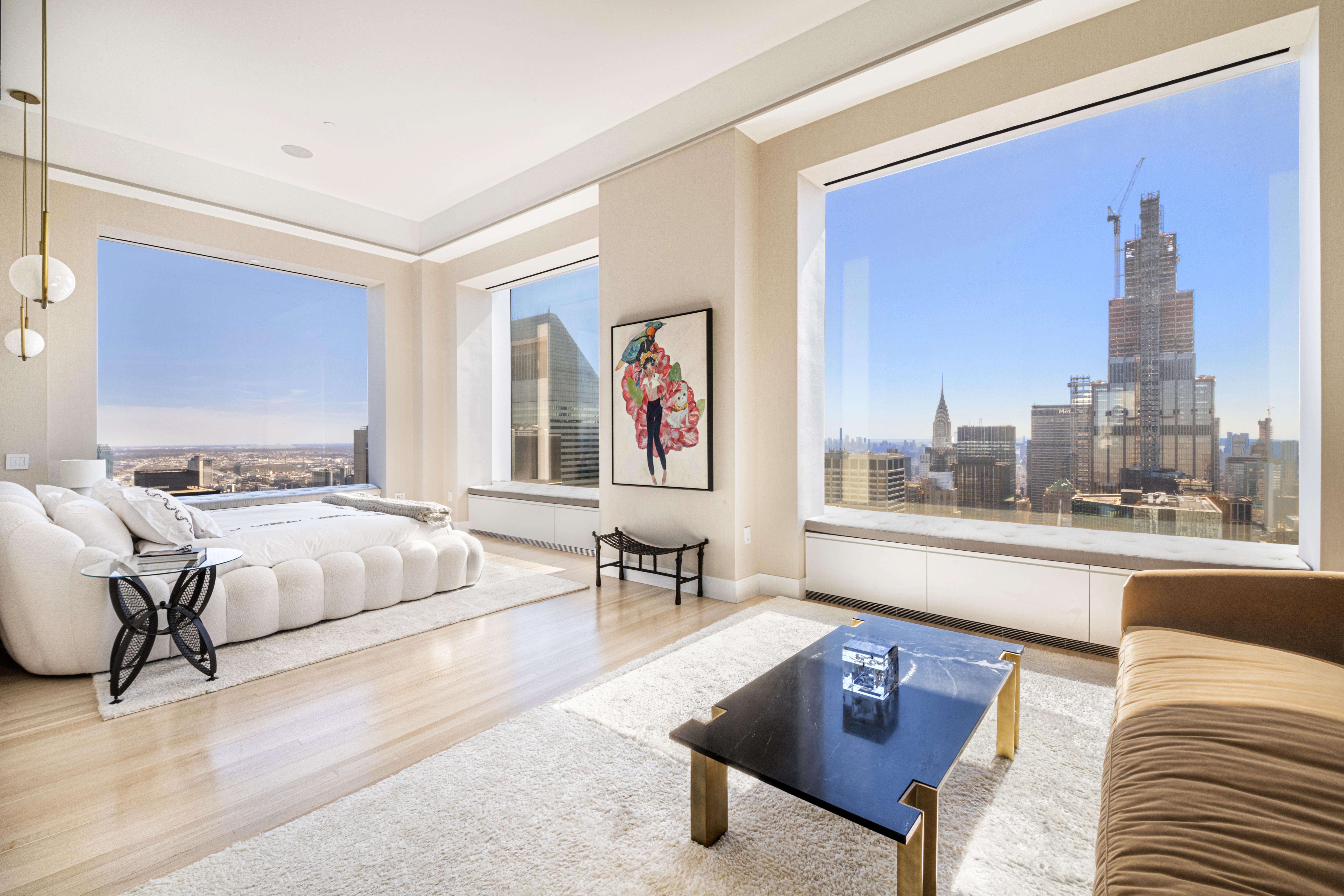 432 Park Avenue, Unit 55A Manhattan, NY 10022 - Photo 6 of 13 a living room with furniture and a large window