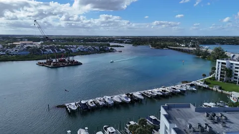 an aerial view of a houses with ocean view
