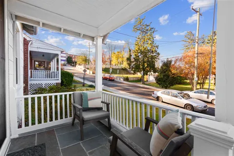 a view of a porch with furniture