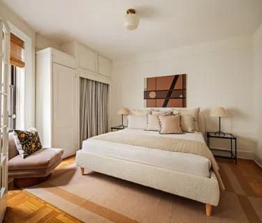 a bathroom with a sink toilet a mirror and shower