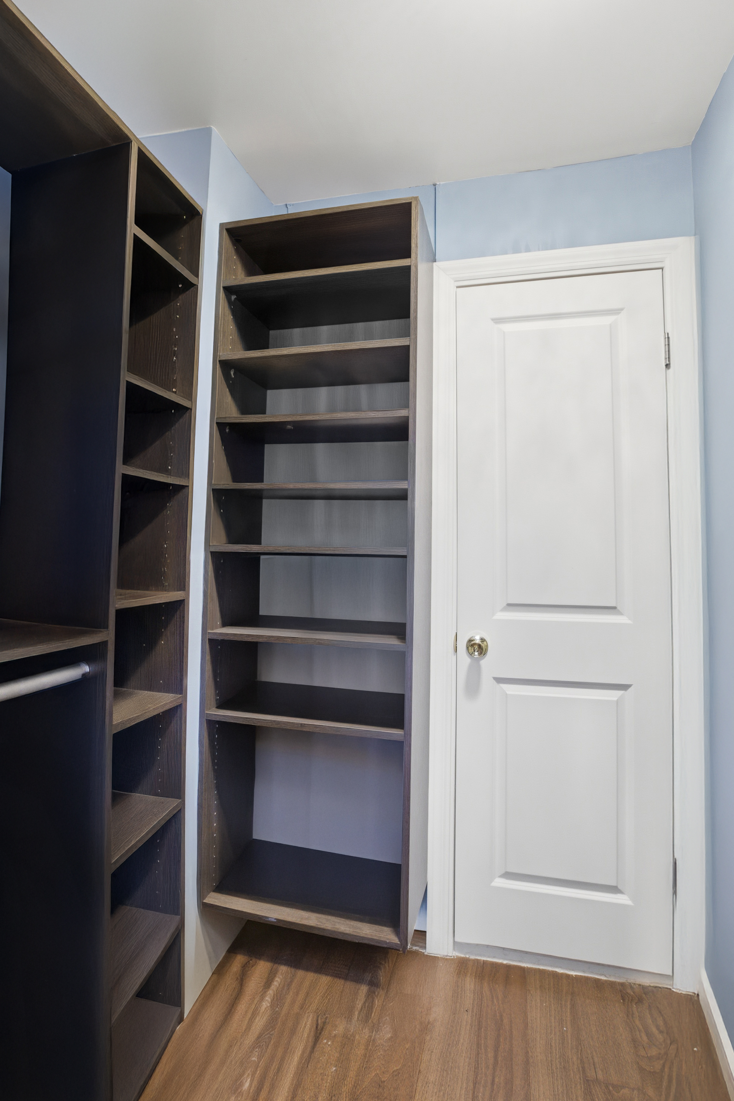 345 East 81st Street, Unit 9D Manhattan, NY 10028 - Photo 9 of 17 a view of walk in closet with empty racks