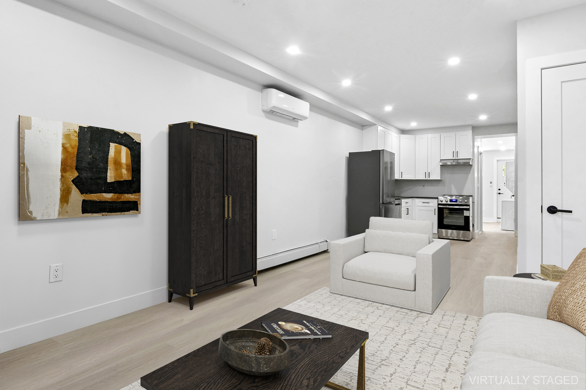 41-05 20th Avenue Queens, NY 11105 - Photo 11 of 20 a living room with furniture and a flat screen tv