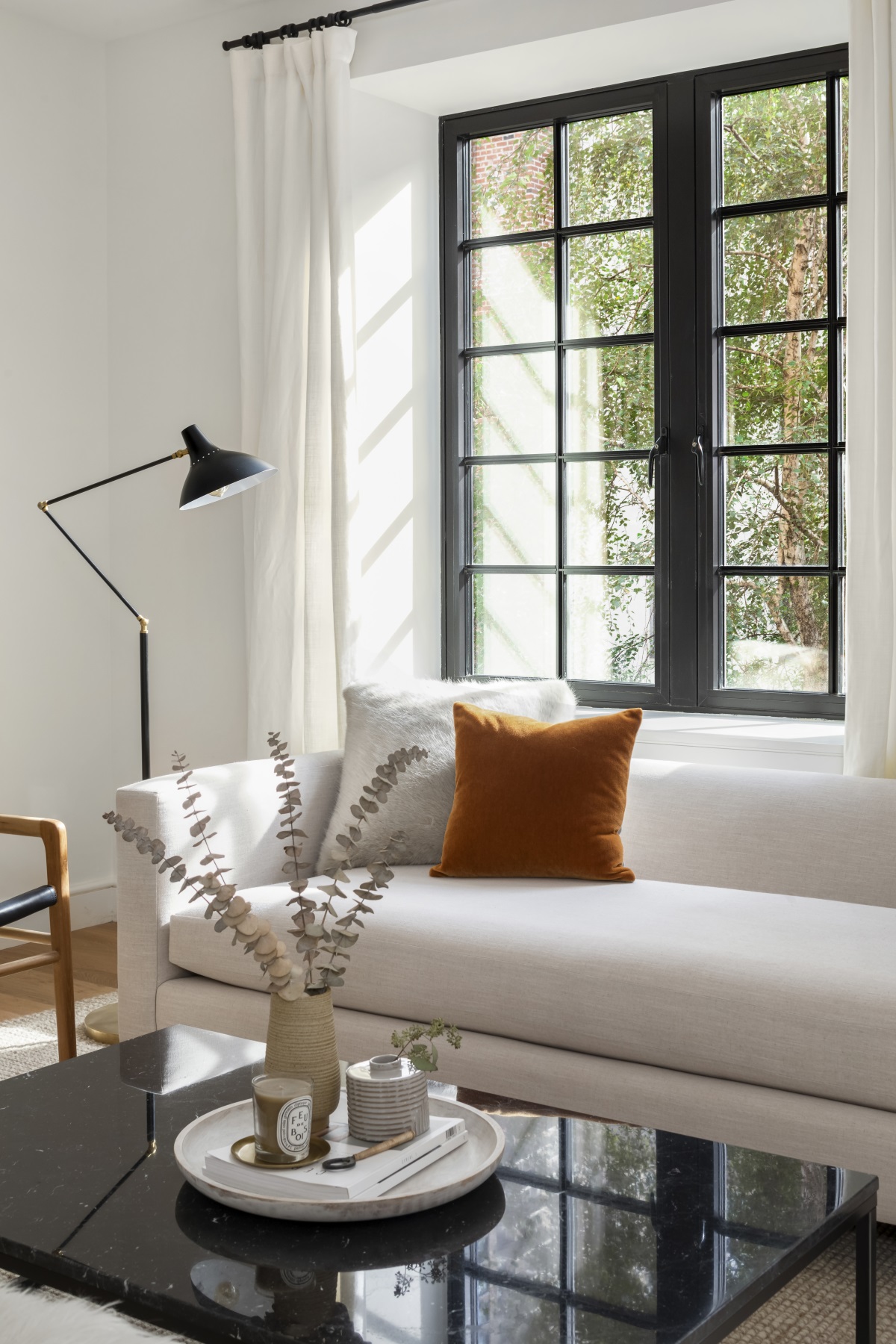 245 East 78th Street, Unit 5A Manhattan, NY 10075 - Photo 2 of 14 a living room with furniture and a large window