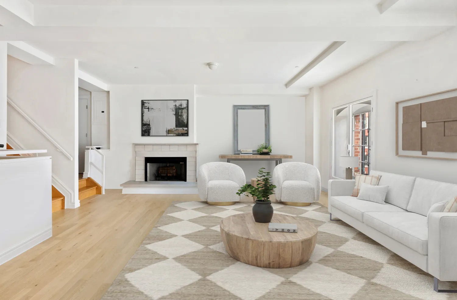 a living room with furniture a fireplace and a table