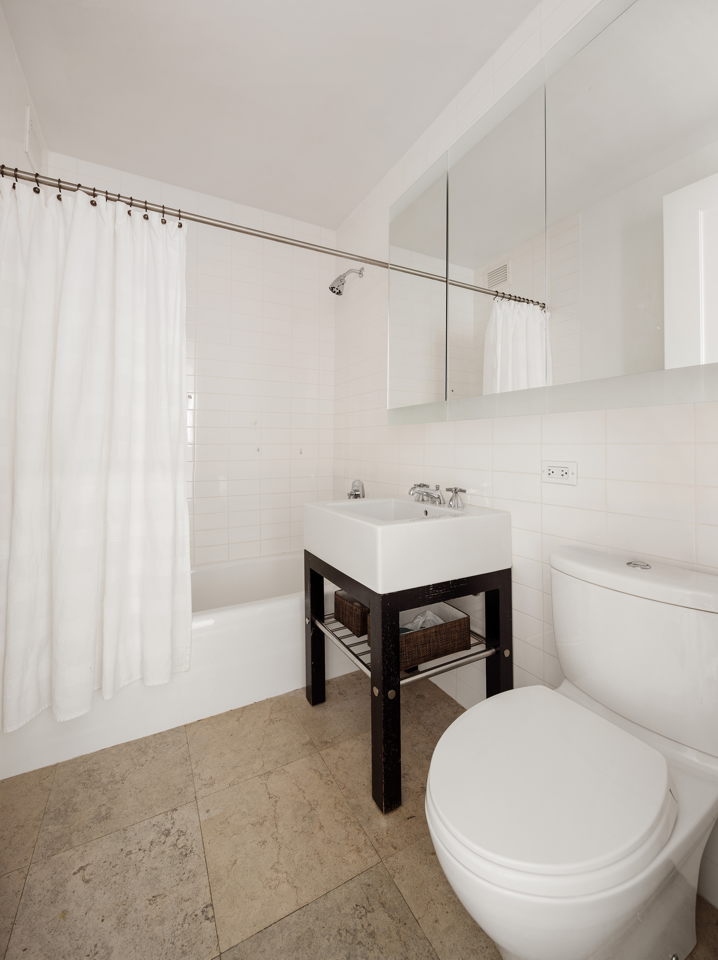 70 Little West Street, Unit 14B Manhattan, NY 10004 - Photo 7 of 17 a bathroom with a sink toilet and shower