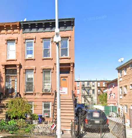 149 Van Buren Street, Unit GARDEN Brooklyn, NY 11221 - Photo 6 of 6 a view of a buildings with a street
